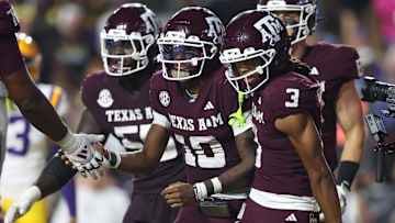 Oct 25, 2025; Baton Rouge, Louisiana, USA; Texas A&M Aggies quarterback Marcel Reed (10) celebrates with wide receiver Ashton Bethel-Roman (3) after a play during the second half against the Louisiana State Tigers at Tiger Stadium. Mandatory Credit: Stephen Lew-Imagn Images