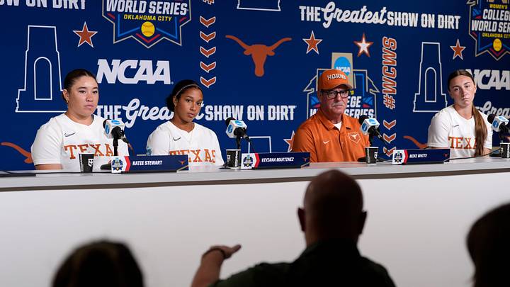 Texas' Katie Stewart, Viviana Martinez, coach Mike White, and Teagan Kavan
