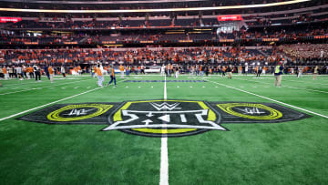 Dec 2, 2023; Arlington, TX, USA;  The Big 12 and WWE logo on the field after the game between the