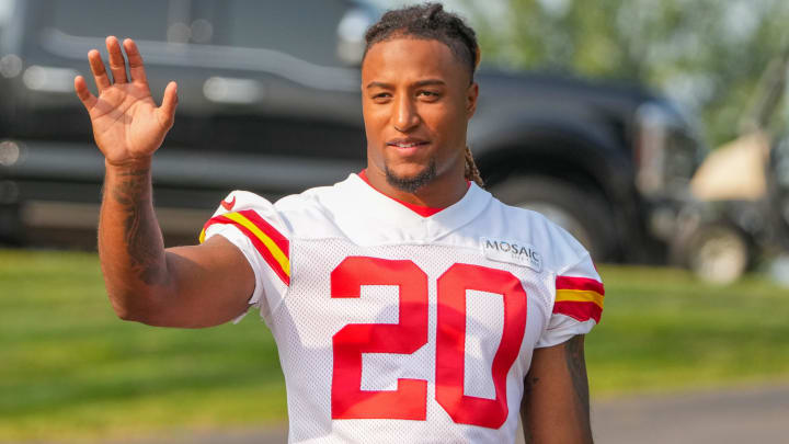 Jul 26, 2024; Kansas City, MO, USA; Kansas City Chiefs safety Justin Reid (20) waves to fans while walking down the hill from the locker room to the fields prior to training camp at Missouri Western State University. Mandatory Credit: Denny Medley-USA TODAY Sports