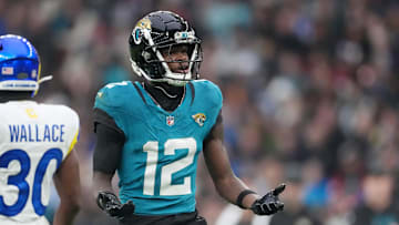 Oct 19, 2025; London, United Kingdom; Jacksonville Jaguars wide receiver Travis Hunter (12) reacts after a play against the Los Angeles Rams during the second half of an NFL International Series game at Wembley Stadium. Mandatory Credit: Kirby Lee-Imagn Images