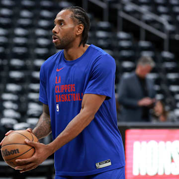 Apr 23, 2024; Los Angeles, California, USA; Los Angeles Clippers forward Kawhi Leonard (2) warms up before the game against the Dallas Mavericks during game two of the first round for the 2024 NBA playoffs at Crypto.com Arena. Mandatory Credit: Kiyoshi Mio-Imagn Images