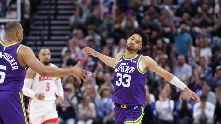 Apr 11, 2024; Salt Lake City, Utah, USA; Utah Jazz guard Johnny Juzang (33) reacts to a shot against the Houston Rockets during the fourth quarter at Delta Center. Mandatory Credit: Rob Gray-USA TODAY Sports