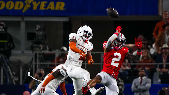 Ohio State receiver Emeka Egbuka has a catch broken up by Texas Longhorns defensive back Jahdae Barron (7) in the Cotton Bowl. Barron finished the season with 46 solo tackles, five interceptions and 11 passes defended. Ohio State receiver Emeka Egbuka has a catch broken up by Texas Longhorns defensive back Jahdae Barron (7) in the Cotton Bowl. Barron finished the season with 46 solo tackles, five interceptions and 11 passes defended.