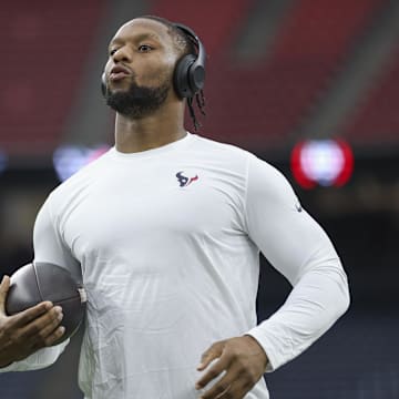 Sep 15, 2024; Houston, Texas, USA; Houston Texans running back Joe Mixon (28) warms up before the game against the Chicago Bears at NRG Stadium. Mandatory Credit: Troy Taormina-Imagn Images