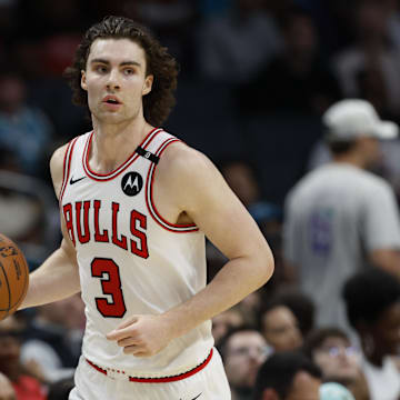 Apr 6, 2025; Charlotte, North Carolina, USA; Chicago Bulls guard Josh Giddey (3) brings the ball upcourt against the Charlotte Hornets during the second half at Spectrum Center. Mandatory Credit: Nell Redmond-Imagn Images