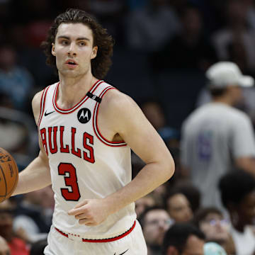 Apr 6, 2025; Charlotte, North Carolina, USA; Chicago Bulls guard Josh Giddey (3) brings the ball upcourt against the Charlotte Hornets during the second half at Spectrum Center. Mandatory Credit: Nell Redmond-Imagn Images