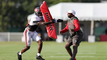Jul 31, 2025; Tampa, FL, USA; Tampa Bay Buccaneers cornerback Benjamin Morrison (21) participates in training camp at AdventHealth Training Center. Mandatory Credit: Nathan Ray Seebeck-Imagn Images