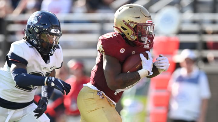 Oct 28, 2023; Chestnut Hill, Massachusetts, USA; Boston College Eagles running back Kye Robichaux (5) runs for a touchdown against the Connecticut Huskies during the second half at Alumni Stadium. Mandatory Credit: Brian Fluharty-USA TODAY Sports