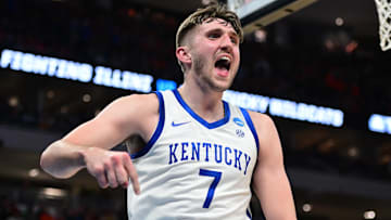 Mar 23, 2025; Milwaukee, WI, USA;  Kentucky Wildcats forward Andrew Carr (7) reacts during the second half in the second round of the NCAA Tournament against the Illinois Fighting Illini at Fiserv Forum. Mandatory Credit: Benny Sieu-Imagn Images