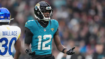 Oct 19, 2025; London, United Kingdom; Jacksonville Jaguars wide receiver Travis Hunter (12) reacts after a play against the Los Angeles Rams.
