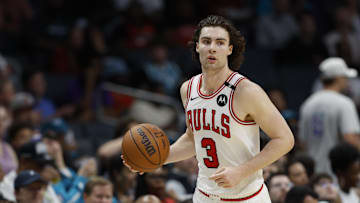 Apr 6, 2025; Charlotte, North Carolina, USA; Chicago Bulls guard Josh Giddey (3) brings the ball upcourt against the Charlotte Hornets during the second half at Spectrum Center. Mandatory Credit: Nell Redmond-Imagn Images