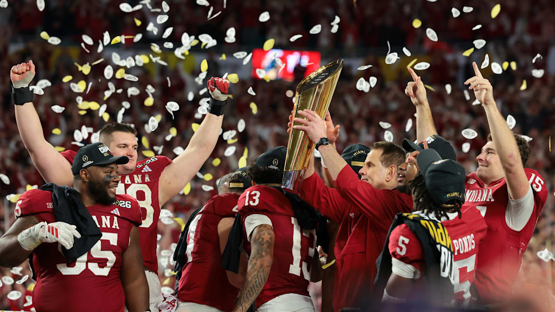 Jan 19, 2026; Miami Gardens, FL, USA; Indiana Hoosiers head coach Curt Cignetti lifts the trophy after the College Football Playoff National Championship game against the Miami Hurricanes at Hard Rock Stadium. Mandatory Credit: Sam Navarro-Imagn Images Jan 19, 2026; Miami Gardens, FL, USA; Indiana Hoosiers head coach Curt Cignetti lifts the trophy after the College Football Playoff National Championship game against the Miami Hurricanes at Hard Rock Stadium. Mandatory Credit: Sam Navarro-Imagn Images
