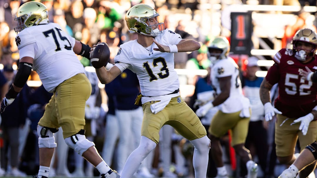 Nov 1, 2025; Chestnut Hill, Massachusetts, USA; Notre Dame Fighting Irish quarterback CJ Carr (13) throws a pass in the first quarter against the Boston College Eagles at Alumni Stadium. Mandatory Credit: Edward Finan-Imagn Images