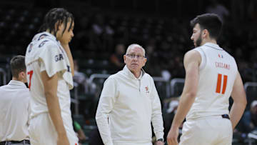 Dec 21, 2023; Coral Gables, Florida, USA; Miami Hurricanes head coach Jim Larranaga looks on against the Stonehill Skyhawks during the second half at Watsco Center. Mandatory Credit: Sam Navarro-Imagn Images