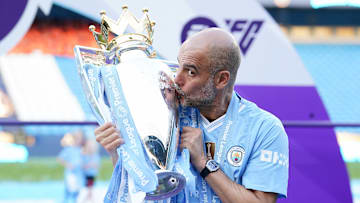Pep Guardiola with the Premier League title in 2024.
