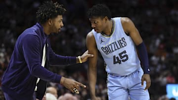 Jan 24, 2024; Miami, Florida, USA; Memphis Grizzlies guard Marcus Smart (36) talks to forward GG
