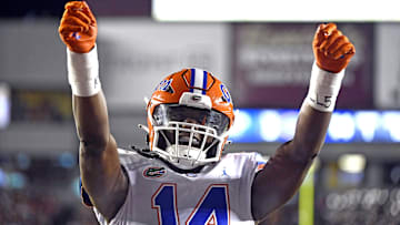 Nov 25, 2022; Tallahassee, Florida, USA; Florida Gators linebacker Chief Borders (14) celebrates during the first half against the Florida State Seminoles at Doak S. Campbell Stadium. Mandatory Credit: Melina Myers-Imagn Images