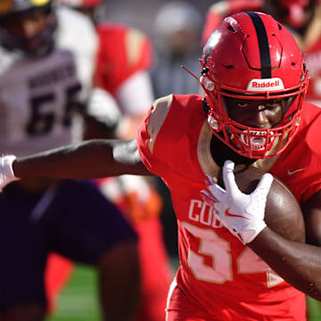 Cardinal Mooney running back Connail Jackson scores in the Cougars' Fall Classic game against Booker.