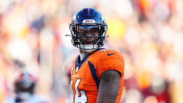 Nov 26, 2023; Denver, Colorado, USA; Denver Broncos wide receiver Courtland Sutton (14) react to his pass interference foul in the first half against the Cleveland Browns at Empower Field at Mile High. Mandatory Credit: Ron Chenoy-Imagn Images