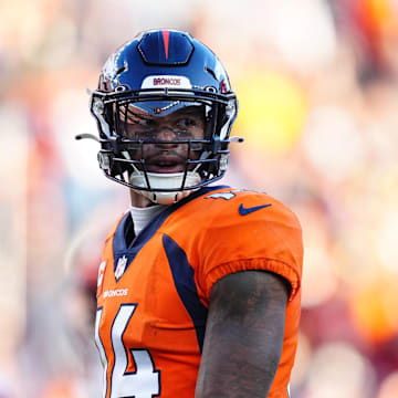 Nov 26, 2023; Denver, Colorado, USA; Denver Broncos wide receiver Courtland Sutton (14) react to his pass interference foul in the first half against the Cleveland Browns at Empower Field at Mile High. Mandatory Credit: Ron Chenoy-Imagn Images