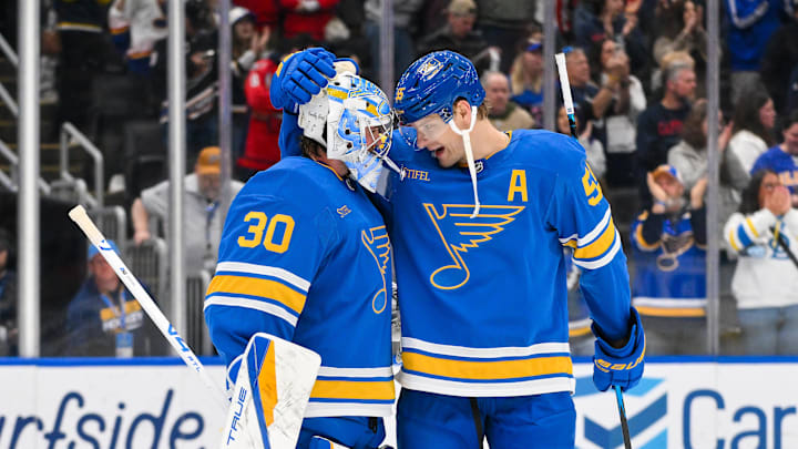 Mar 24, 2026; St. Louis, Missouri, USA; St. Louis Blues goaltender Joel Hofer (30) celebrates with defenseman Colton Parayko (55) after the Blues defeated the Washington Capitals at Enterprise Center. Mandatory Credit: Jeff Curry-Imagn Images