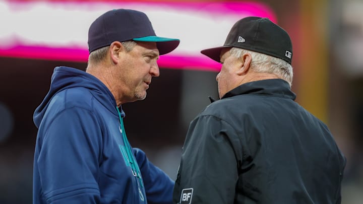 Apr 14, 2026; San Diego, California, USA; Seattle Mariners manager Dan Wilson (6) argues the balk call with first base umpire Bill Miller during the second inning against the San Diego Padres at Petco Park. Mandatory Credit: David Frerker-Imagn Images
