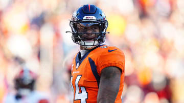 Nov 26, 2023; Denver, Colorado, USA; Denver Broncos wide receiver Courtland Sutton (14) react to his pass interference foul in the first half against the Cleveland Browns at Empower Field at Mile High. Mandatory Credit: Ron Chenoy-USA TODAY Sports