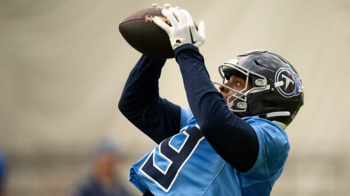 Wide receiver Jha'Quan Jackson (19) hauls in a pass during the Tennessee Titans mandatory mini-camp at Ascension Saint Thomas Sports Park.