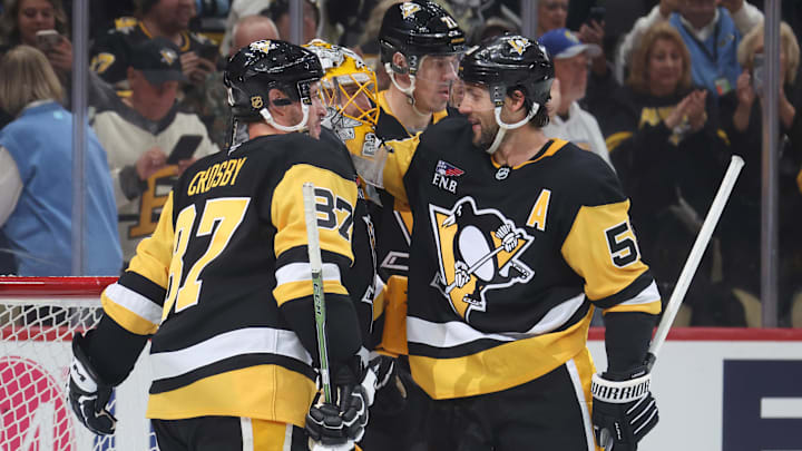 Sep 27, 2025; Pittsburgh, Pennsylvania, USA; Pittsburgh Penguins goaltender Marc-Andre Fleury (29) is embraced by center Evgeni Malkin (71) and center Sidney Crosby (87) and defenseman Kris Letang (58) after his final NHL game to defeat the Columbus Blue Jackets at PPG Paints Arena. Mandatory Credit: Charles LeClaire-Imagn Images Sep 27, 2025; Pittsburgh, Pennsylvania, USA; Pittsburgh Penguins goaltender Marc-Andre Fleury (29) is embraced by center Evgeni Malkin (71) and center Sidney Crosby (87) and defenseman Kris Letang (58) after his final NHL game to defeat the Columbus Blue Jackets at PPG Paints Arena. Mandatory Credit: Charles LeClaire-Imagn Images