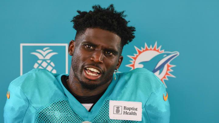 Miami Dolphins wide receiver Tyreek Hill (10) talks to reporters after a joint practice with the Atlanta Falcons