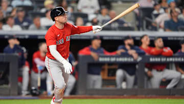Aug 22, 2025; Bronx, New York, USA; Boston Red Sox third baseman Alex Bregman (2) hits a fly ball against the New York Yankees during the seventh inning at Yankee Stadium. Mandatory Credit: Gregory Fisher-Imagn Images