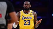 Dec 31, 2024; Los Angeles, California, USA; Los Angeles Lakers forward LeBron James (23) reacts during the first half at Crypto.com Arena. Mandatory Credit: Gary A. Vasquez-Imagn Images