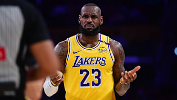 Dec 31, 2024; Los Angeles, California, USA; Los Angeles Lakers forward LeBron James (23) reacts during the first half at Crypto.com Arena. Mandatory Credit: Gary A. Vasquez-Imagn Images