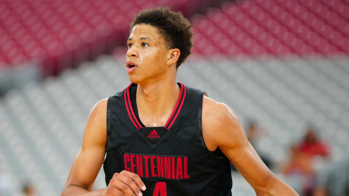 Corona Centennial wing Carter Bryant (4), a five-star commit to University of Arizona, dribbles against Corner Canyon during the Section 7 Basketball Tournament at State Farm Stadium in Glendale on June 23, 2023.