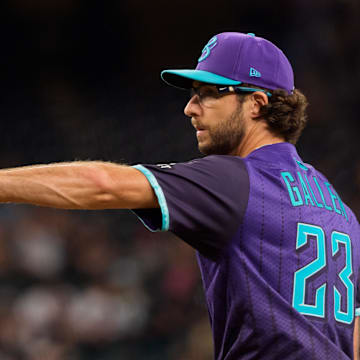 Aug 8, 2025; Phoenix, Arizona, USA; Arizona Diamondbacks pitcher Zac Gallen (23) pitches for the start of a game against the Colorado Rockies at Chase Field. Mandatory Credit: Allan Henry-Imagn Images