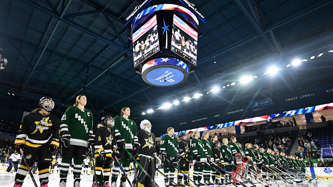 Jan 3, 2024; Lowell, MA, USA; Members of the Boston team lineup for the National Anthem before a PWHL ice hockey game against Minnesota at Tsongas Center. Mandatory Credit: Brian Fluharty-Imagn Images