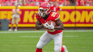 Sep 14, 2025; Kansas City, Missouri, USA; Kansas City Chiefs running back Kareem Hunt (29) runs the ball against the Philadelphia Eagles during the game at GEHA Field at Arrowhead Stadium. Mandatory Credit: Denny Medley-Imagn Images