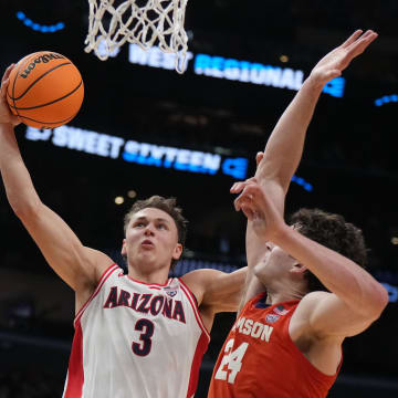 Mar 28, 2024; Los Angeles, CA, USA; Arizona Wildcats guard Pelle Larsson (3) shoots against Clemson Tigers center PJ Hall (24) in the first half in the semifinals of the West Regional of the 2024 NCAA Tournament at Crypto.com Arena. Mandatory Credit: Kirby Lee-USA TODAY Sports