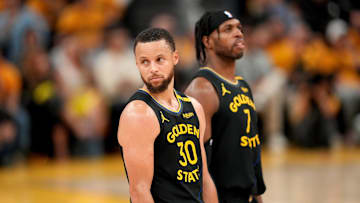May 2, 2025; San Francisco, California, USA; Golden State Warriors guard Stephen Curry (30) stands on the court next to guard Buddy Hield (7) during a break in the action against the Houston Rockets in the fourth quarter of game six of the first round for the 2025 NBA Playoffs at Chase Center. Mandatory Credit: Cary Edmondson-Imagn Images