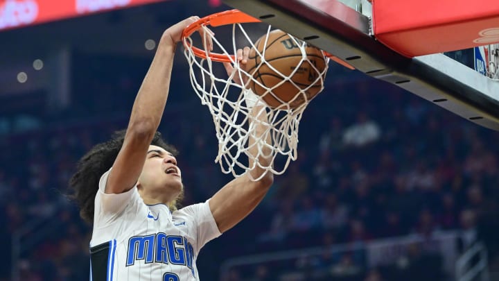 Orlando Magic guard Anthony Black (0) dunks during the first quarter against the Cleveland Cavaliers at Rocket Mortgage FieldHouse. 