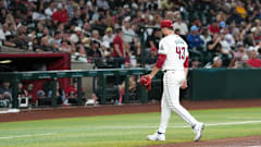 Slade Cecconi walks of mound at Chase Field in the 5th trailing 5-0 against San Diego May 3, 2024