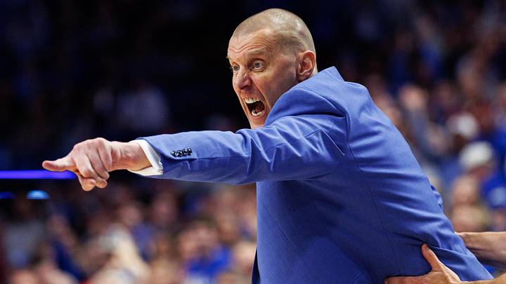 Dec 13, 2025; Lexington, Kentucky, USA; Kentucky Wildcats head coach Mark Pope yells to his players during the second half against the Indiana Hoosiers at Rupp Arena at Central Bank Center. Mandatory Credit: Jordan Prather-Imagn Images