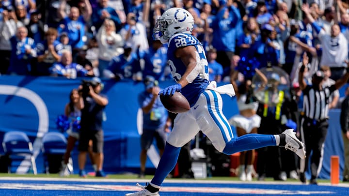 Indianapolis Colts running back Jonathan Taylor (28) celebrates as he runs in for a touchdown Sunday, Sept. 8, 2024, during a game against the Houston Texans at Lucas Oil Stadium in Indianapolis.