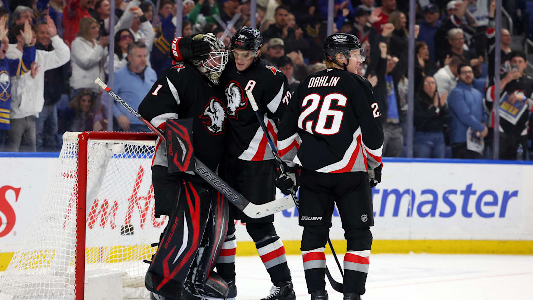 Apr 6, 2026; Buffalo, New York, USA;  Buffalo Sabres goaltender Ukko-Pekka Luukkonen (1), center Tage Thompson (72) and defenseman Rasmus Dahlin (26) celebrate a win over the Tampa Bay Lightning at KeyBank Center. Mandatory Credit: Timothy T. Ludwig-Imagn Images