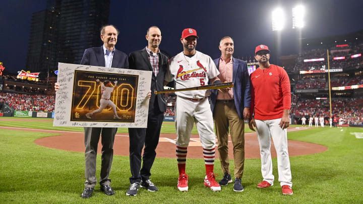 Sep 30, 2022; St. Louis, Missouri, USA;  (L-R) St. Louis Cardinals chairman Bill DeWitt Sr president Bill DeWitt III designated hitter Albert Pujols (5) president of baseball operations John Mozeliak and manager Oliver Marmol (37) pose for photo during a ceremony to celebrate Albert Pujols 700th career home run before a game against the Pittsburgh Pirates at Busch Stadium. Mandatory Credit: Jeff Curry-USA TODAY Sports