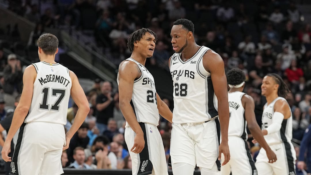 Nov 9, 2022; San Antonio, Texas, USA;  San Antonio Spurs guard Devin Vassell (24) celebrates a play by San Antonio Spurs center Charles Bassey (28) in the first half against the Memphis Grizzlies at the AT&T Center. Mandatory Credit: Daniel Dunn-Imagn Images