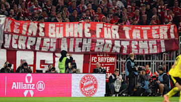 Bayern Munich fans protesting against Jerome Boateng during Der Klassiker.