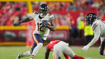 Aug 22, 2024; Kansas City, Missouri, USA; Chicago Bears wide receiver Velus Jones Jr. (12) runs for a touchdown against Kansas City Chiefs safety Tyree Gillespie (46) during the second half at GEHA Field at Arrowhead Stadium. Mandatory Credit: Jay Biggerstaff-USA TODAY Sports