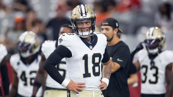 Aug 10, 2024; Glendale, Arizona, USA; New Orleans Saints quarterback Spencer Rattler (18) against the Arizona Cardinals during a preseason NFL game at State Farm Stadium. Mandatory Credit: Mark J. Rebilas-USA TODAY Sports